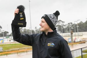Bendigo Greyhound Racing Association general manager Charlton Hindle with the Mark Hughes Foundation beanies that will be on sale at Friday's charity race night at Lord's Raceway. 